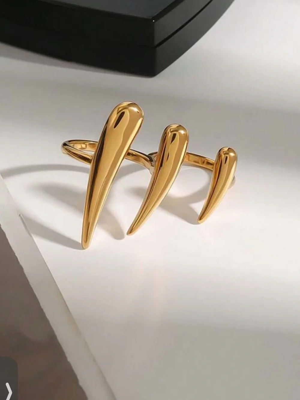 Modern Sleek Gold Claw Ring